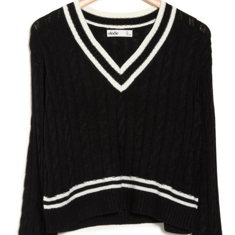 Black and white cropped knit sweater varsity style